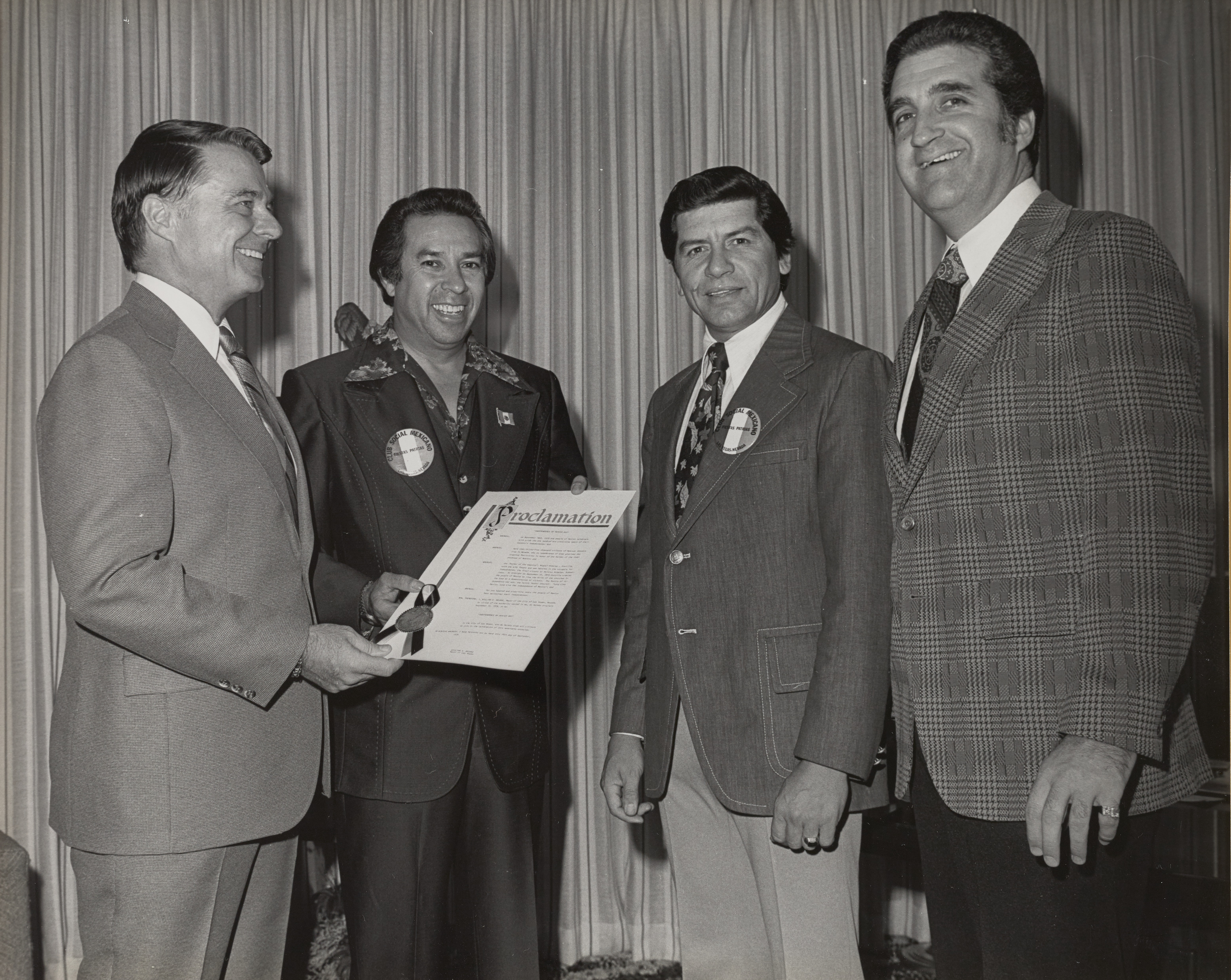 Photograph of Mayor Briare and Ron Lurie giving Proclamation to members of Club Social Mexicano