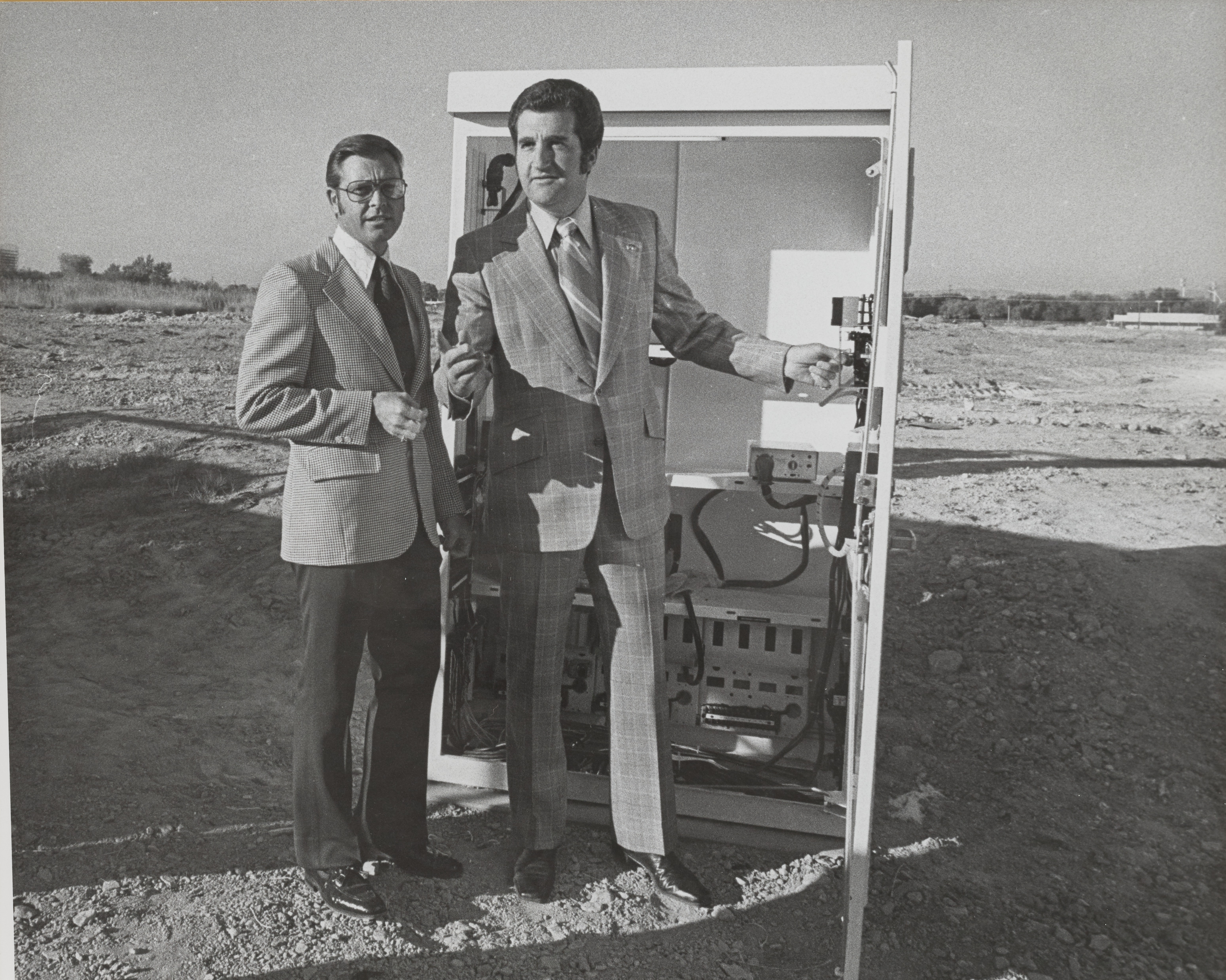 Photograph of Ron Lurie flipping the switch at the junction box