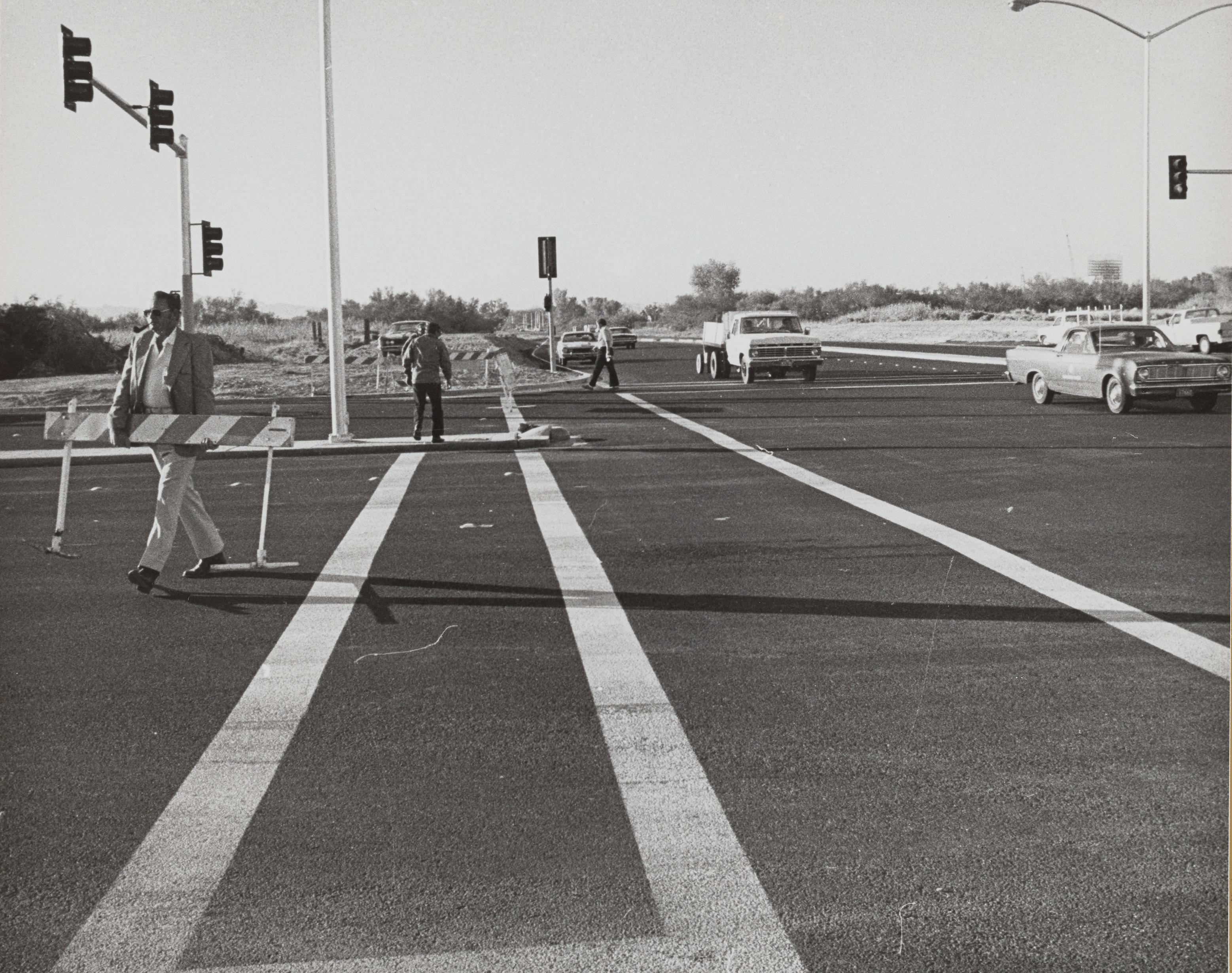 Photograph of intersection with traffic light installation