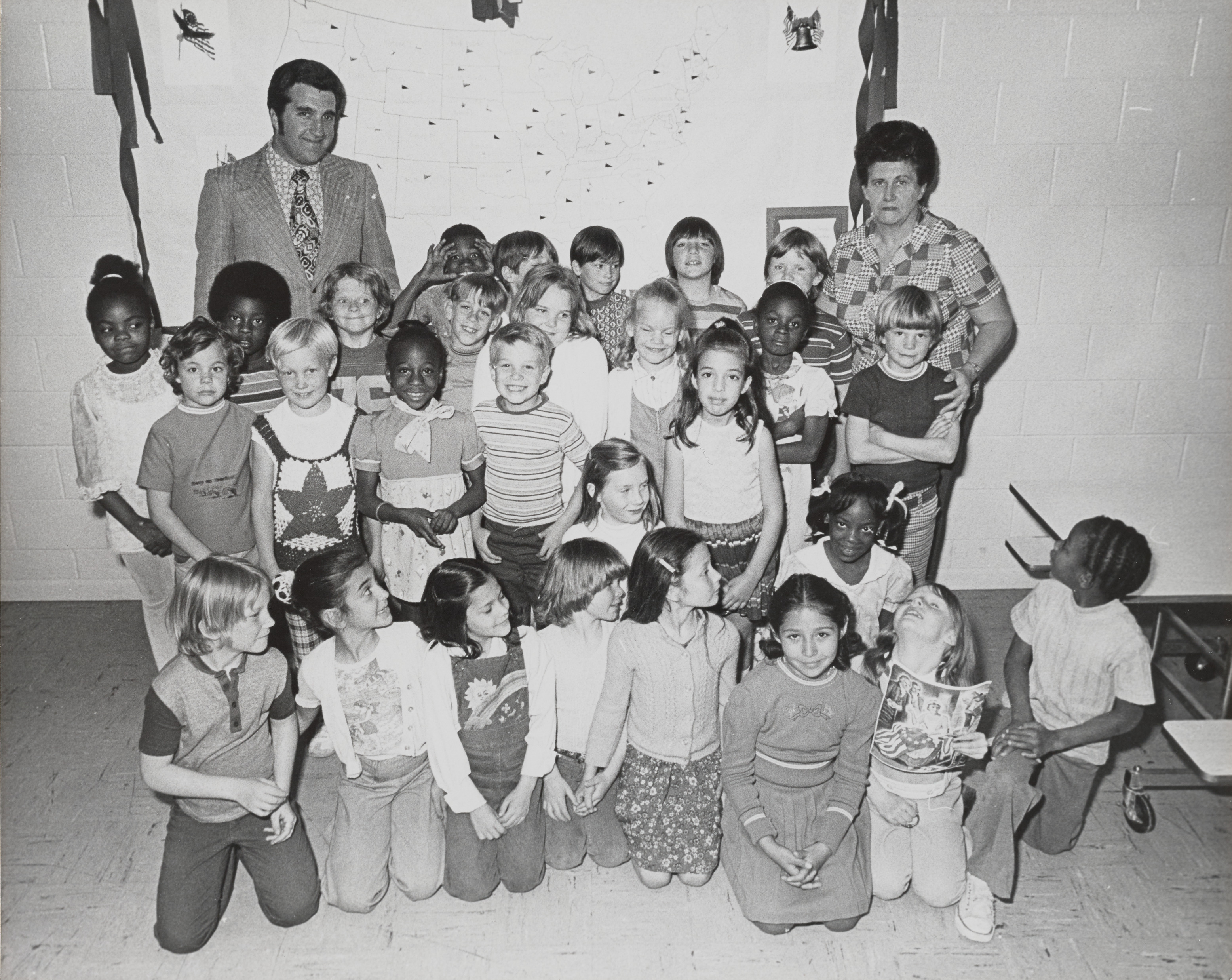 Photograph of Ron Lurie with group of children