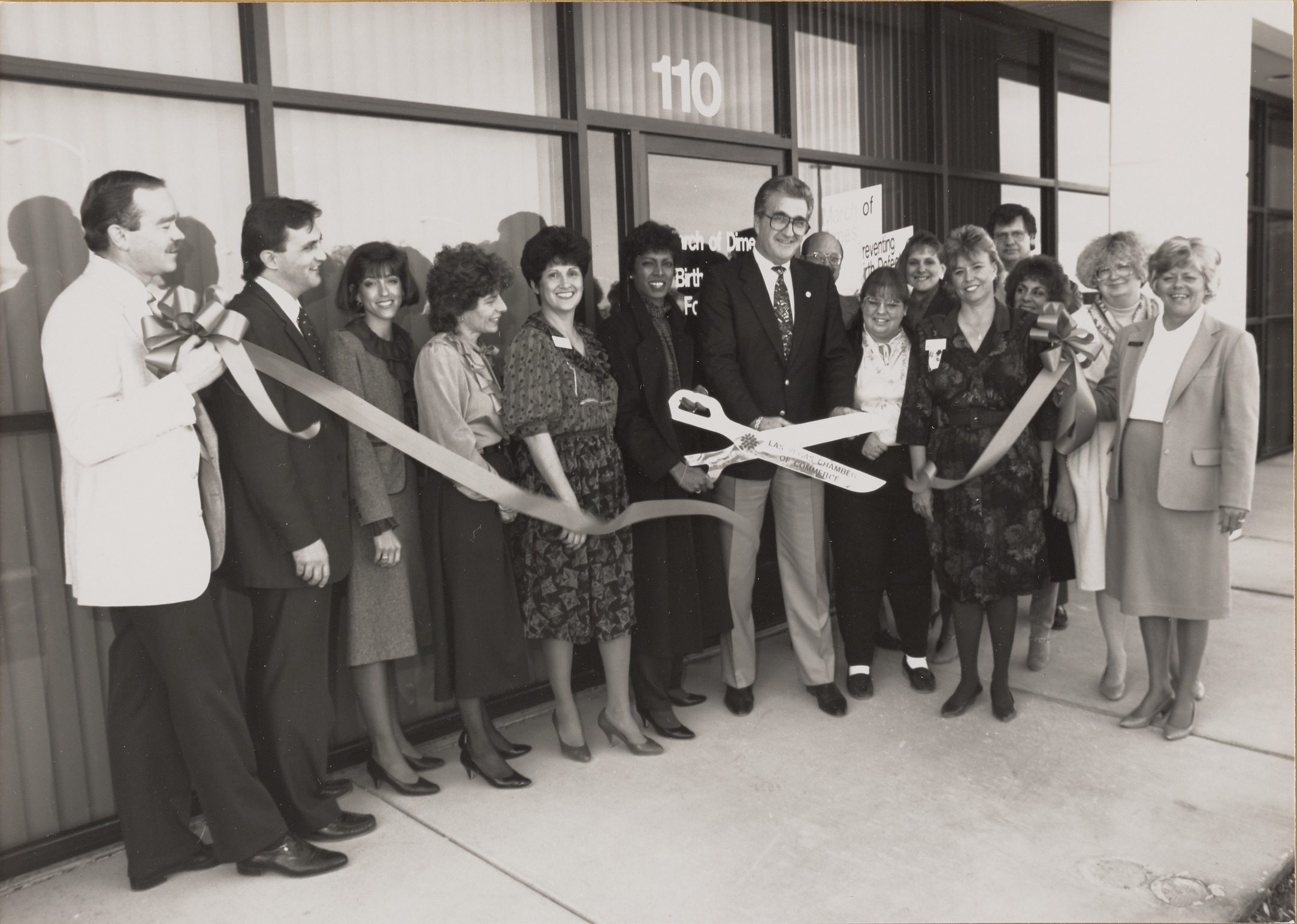 Photograph of ribbon cutting for March of Dimes foundation building