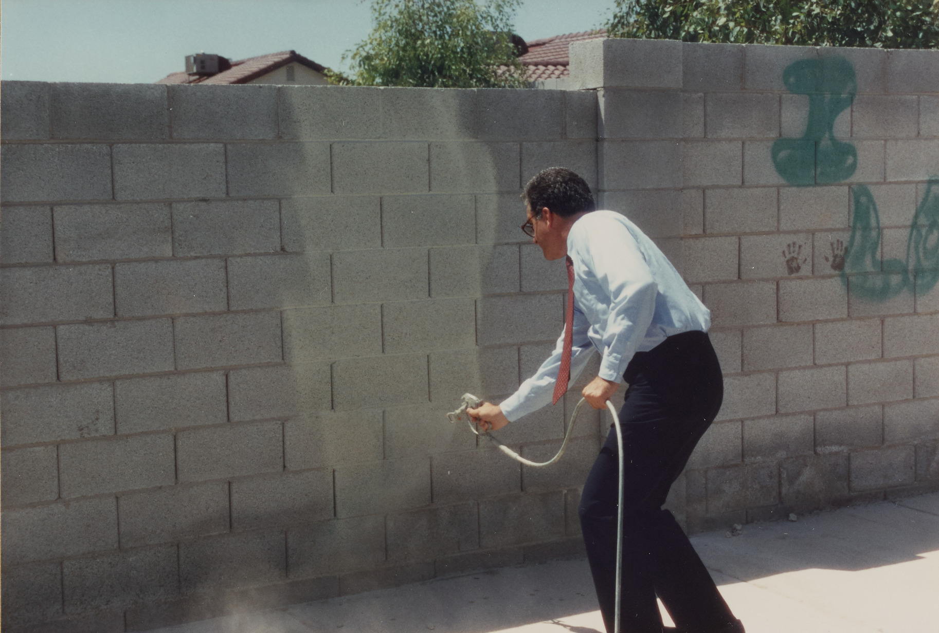 Photograph of Ron Lurie at event for graffiti removal