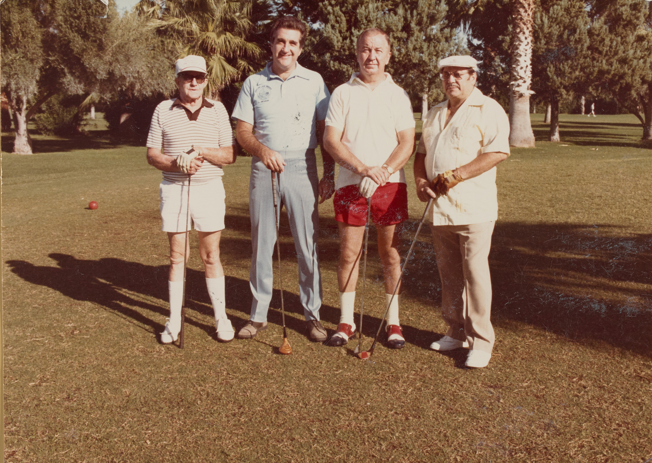 Photograph of Ron Lurie with Herb Gallup, Bernie Fritz (FBI), Herman Gallindo (LV Distributor) at Dunes Hotel Golf Tournament, Teamster 14