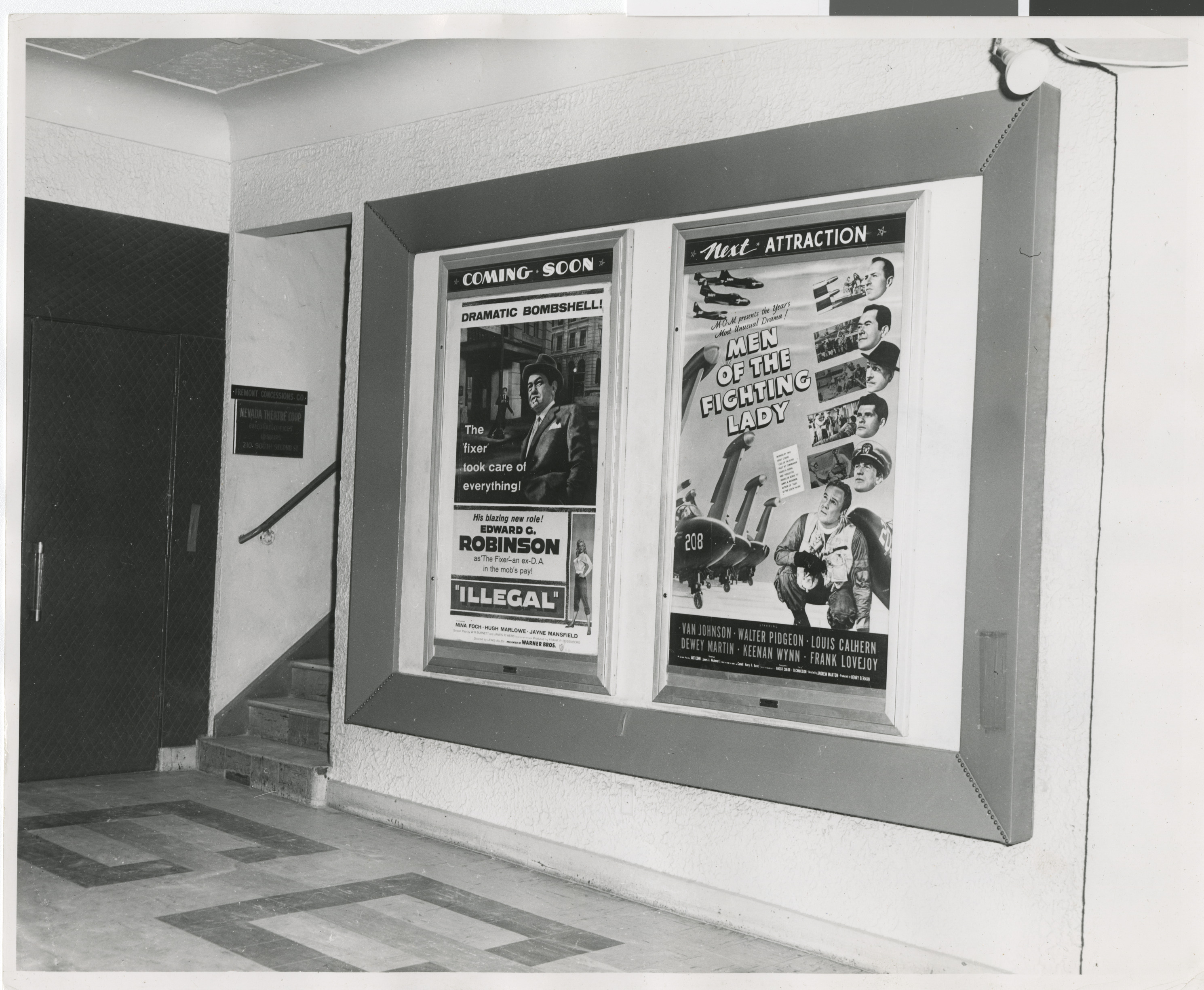 Photograph of interior of Guild Theater billboards