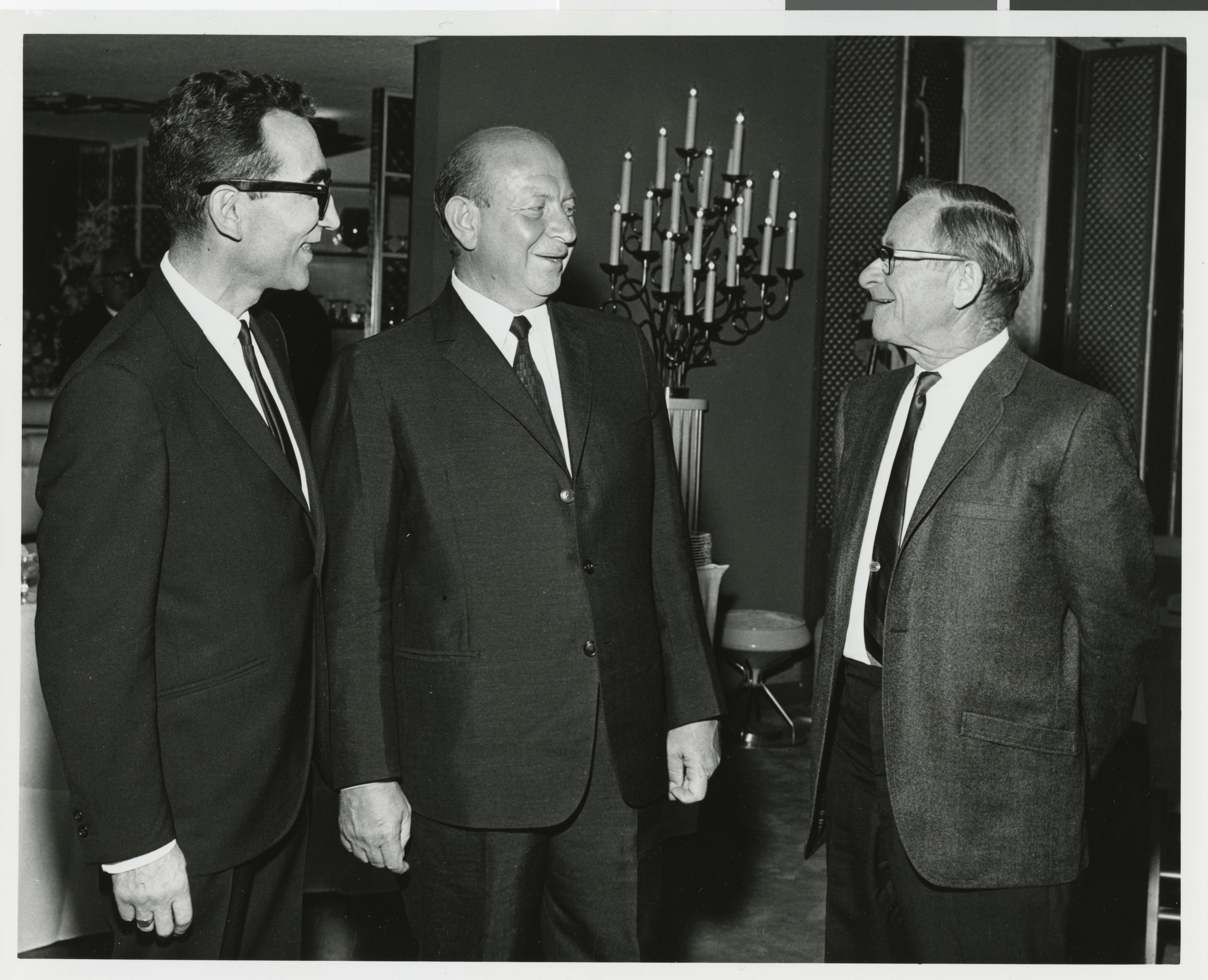 Photograph of unknown, Dr. Kalman Mann, and George Burns