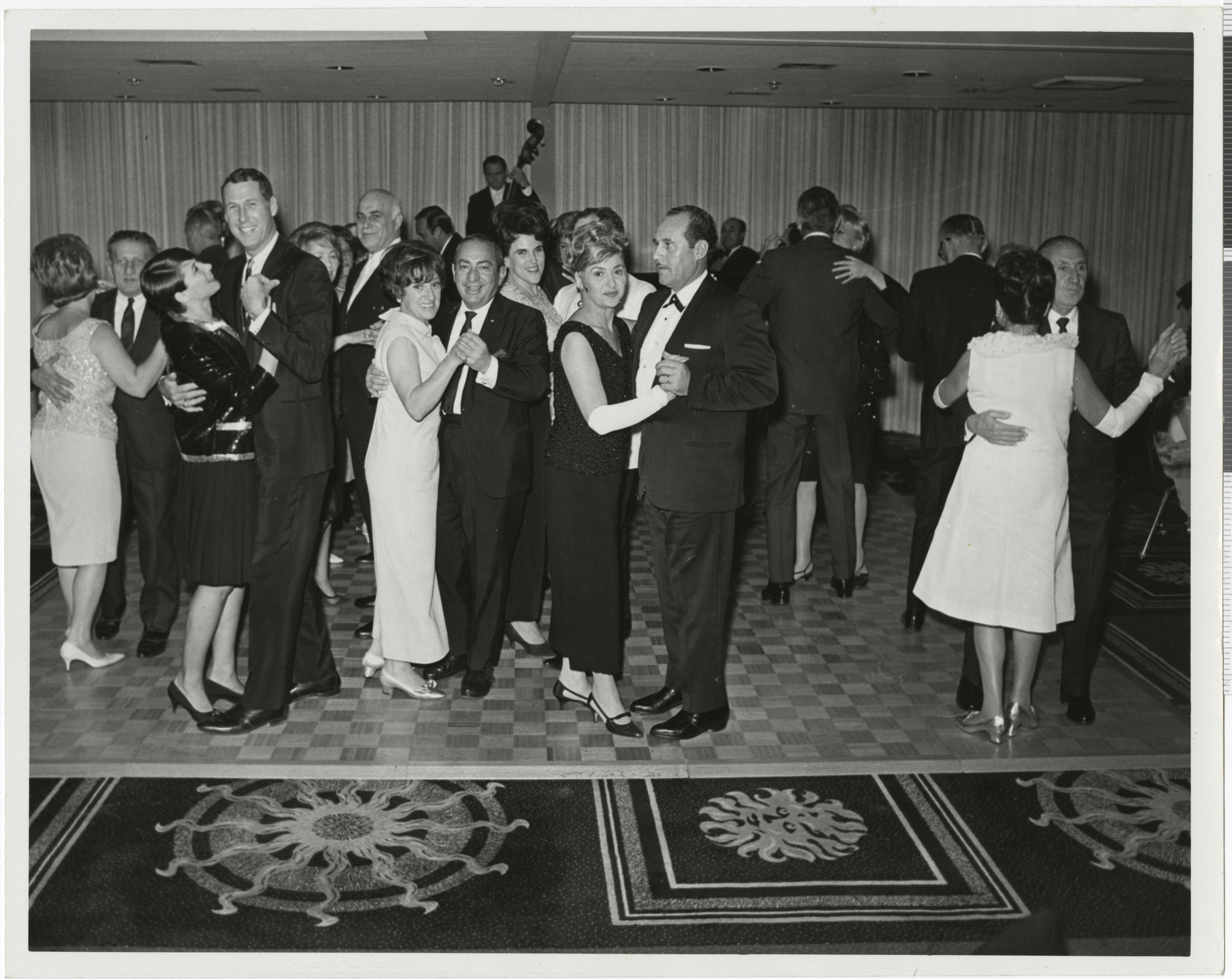 Black and white photo of couples dancing at an event, no date