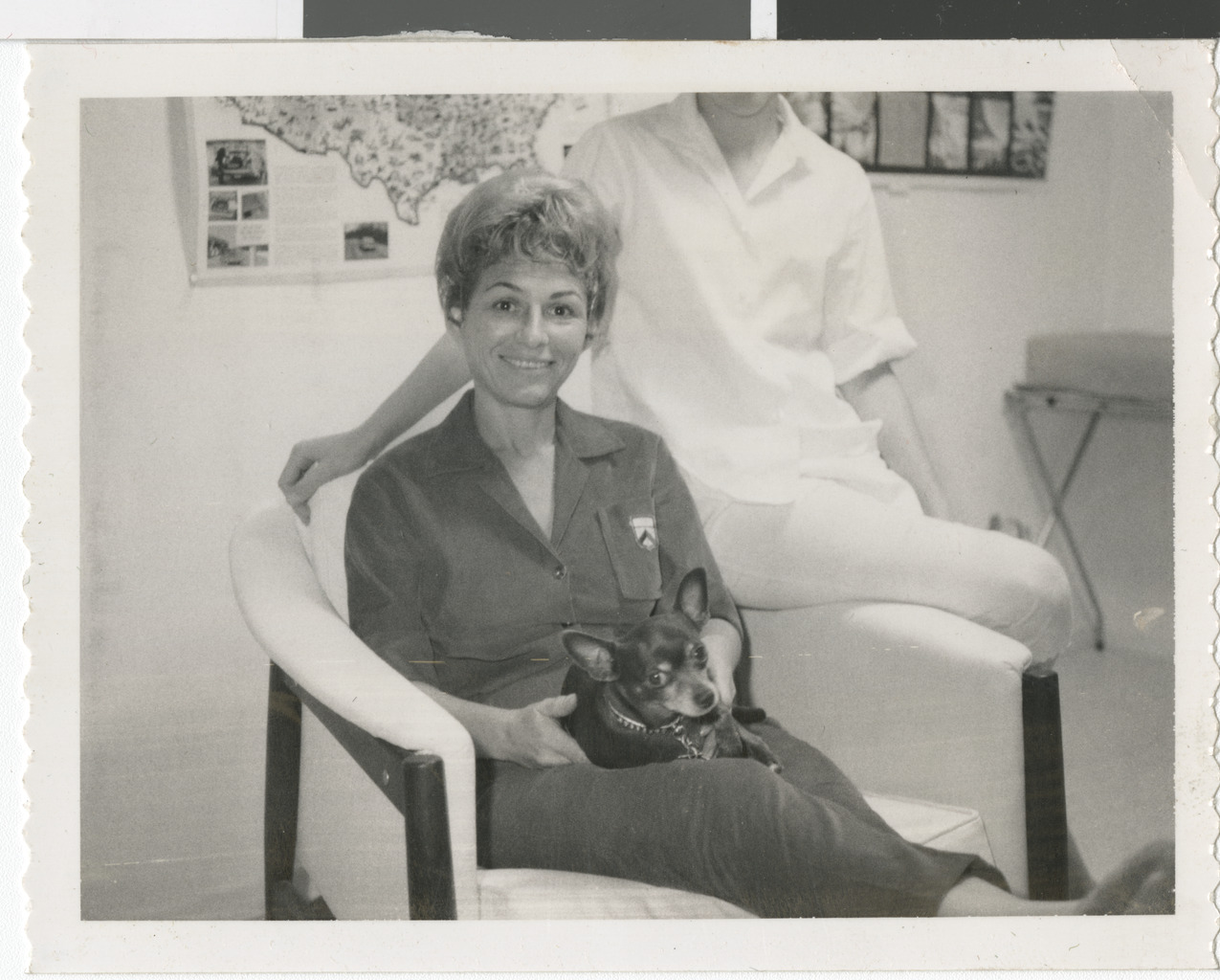 Photograph of Eileen Brookman with a dog, undated