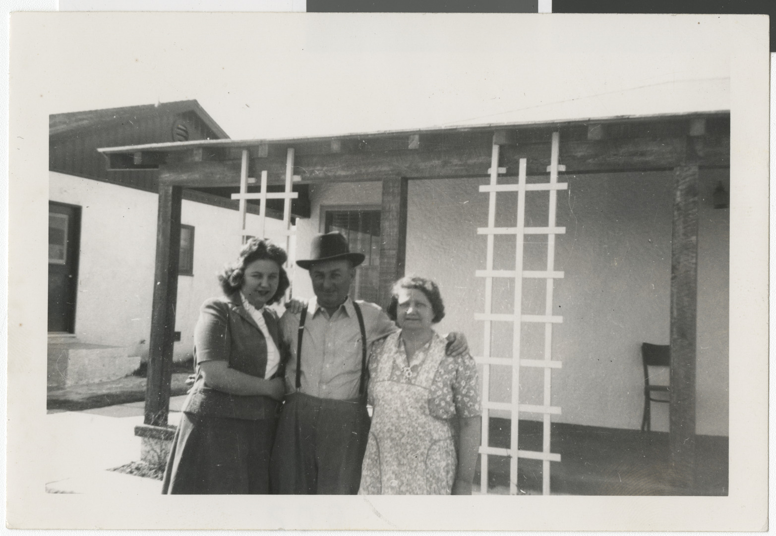 Photograph of Adele Salton (Baratz) with parents before nursing school, before 1944