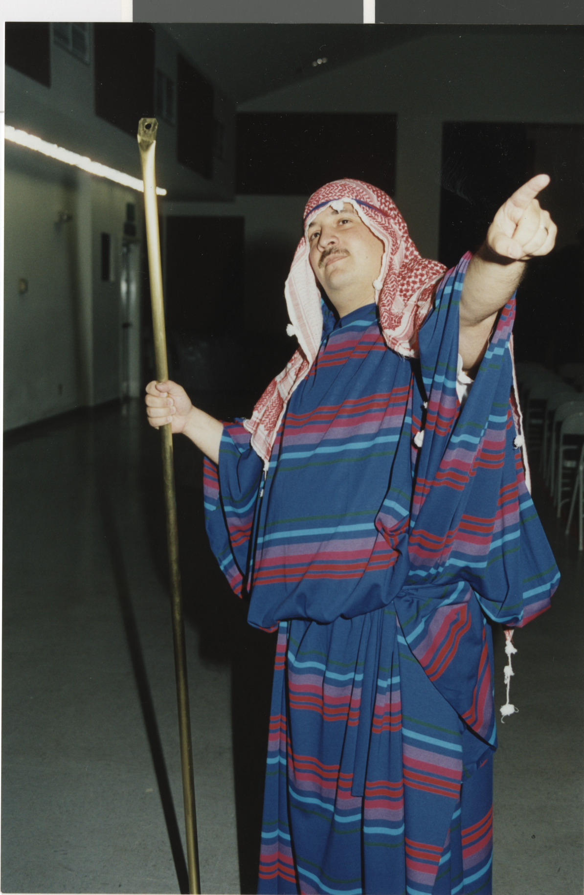 Photograph of man dressed as Moses, 1990s