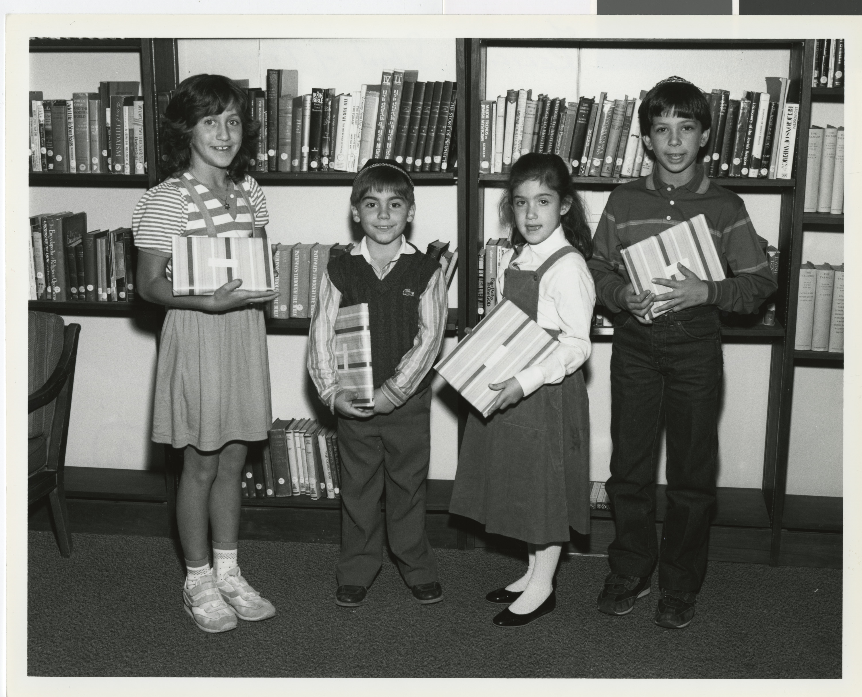 Photograph of grand prize winners of the Nate Mack Religious School of Temple Beth Sholom "Read a Jewish Book""book report contest, 1980s