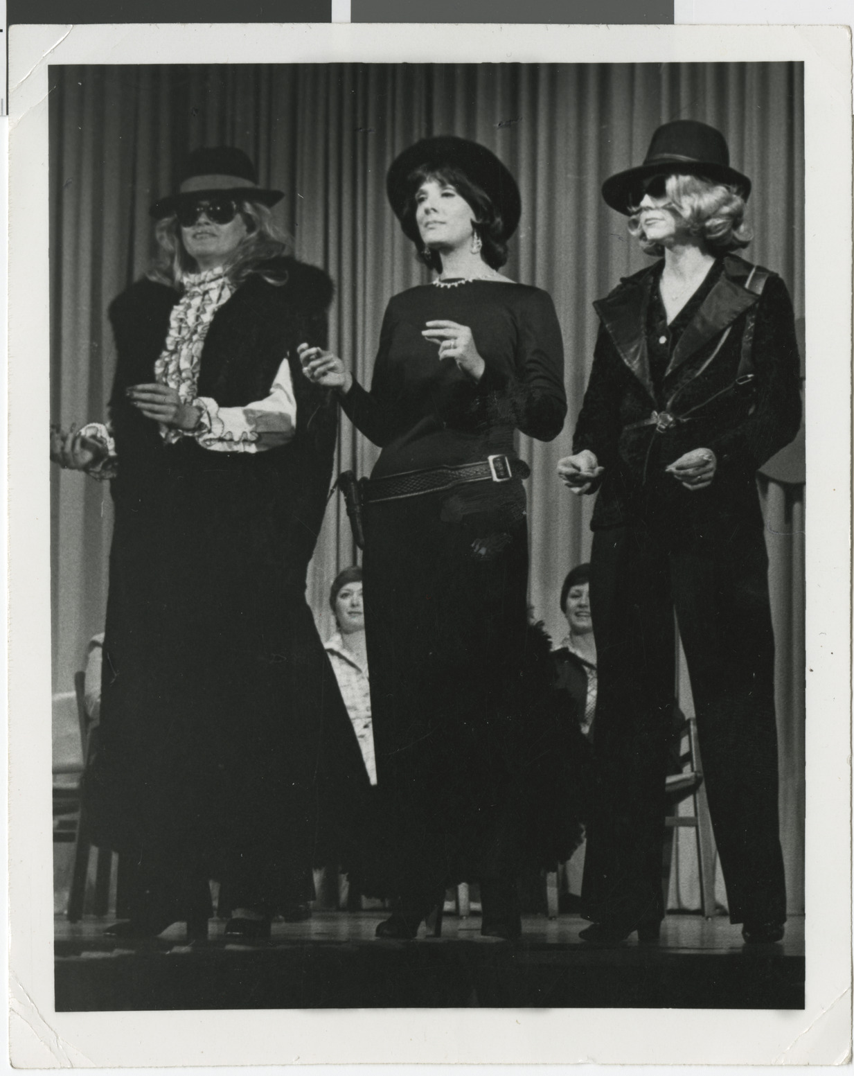 Photograph of actors on stage