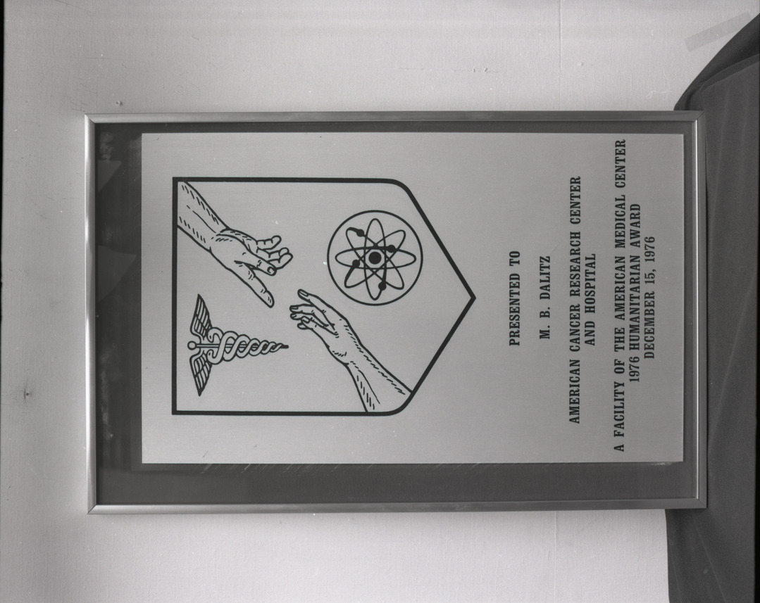 Film negative of plaque, Humanitarian Award for M.B. Dalitz from the American Cancer Research Center and Hospital, 1976