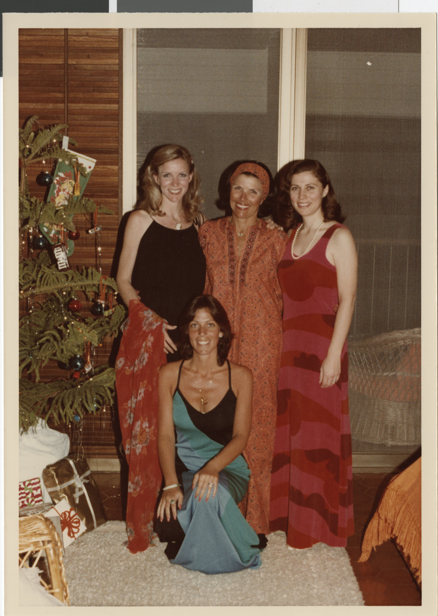 Photograph of Joyce Mack (standing, center) with daughters Barbara, Karen and Marilynn in Hawaii