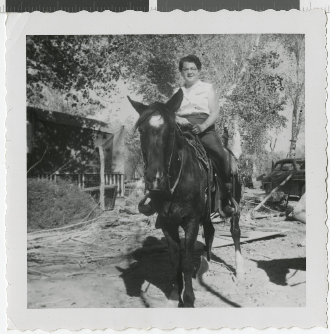 Photograph of Lee Pearson on a horse, circa 1950