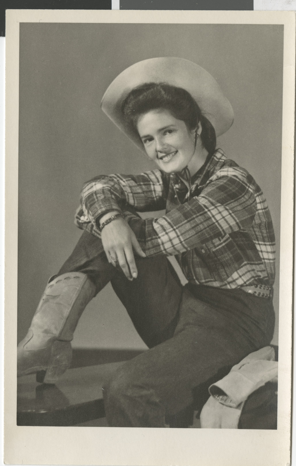 Postcard with photograph of Bella Stern in western wear, circa 1950