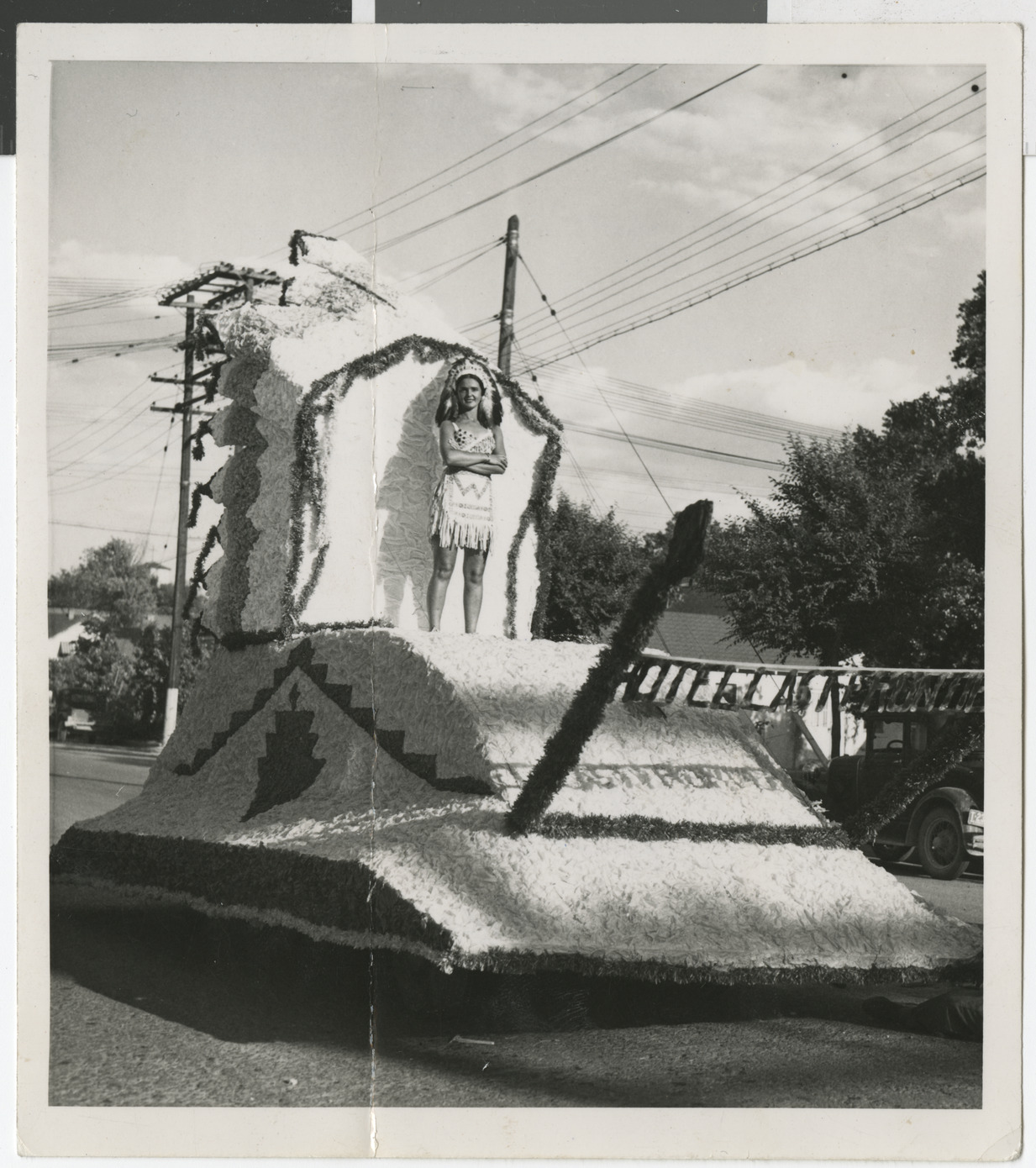 Photograph of Bella Stern on a parade float, Helldorado Parade, Las Vegas, 1944