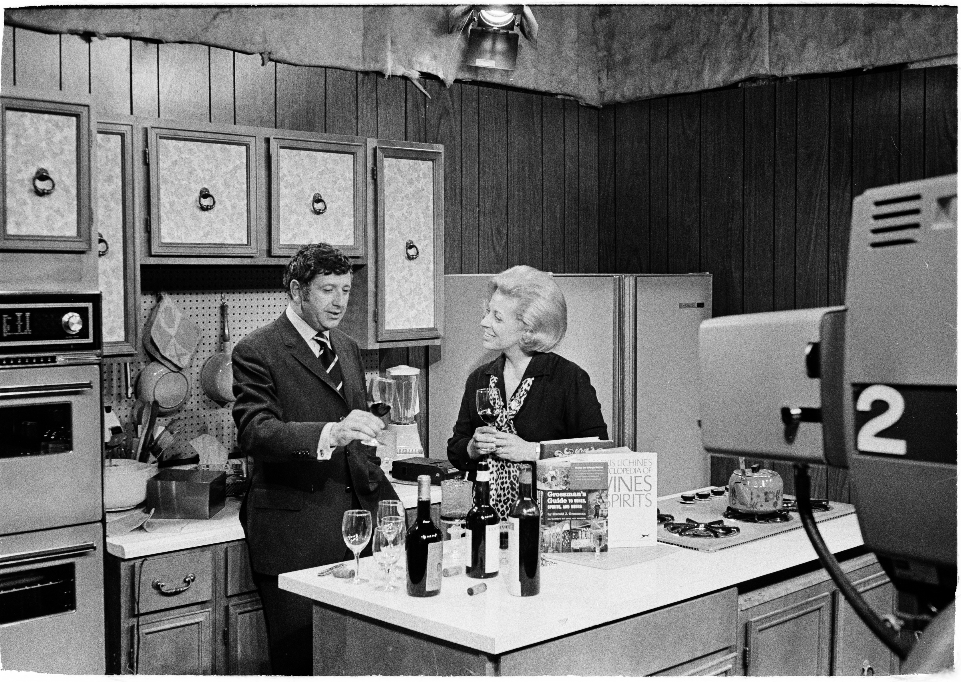 Photographs of Muriel Stevens and guests cooking, image 1