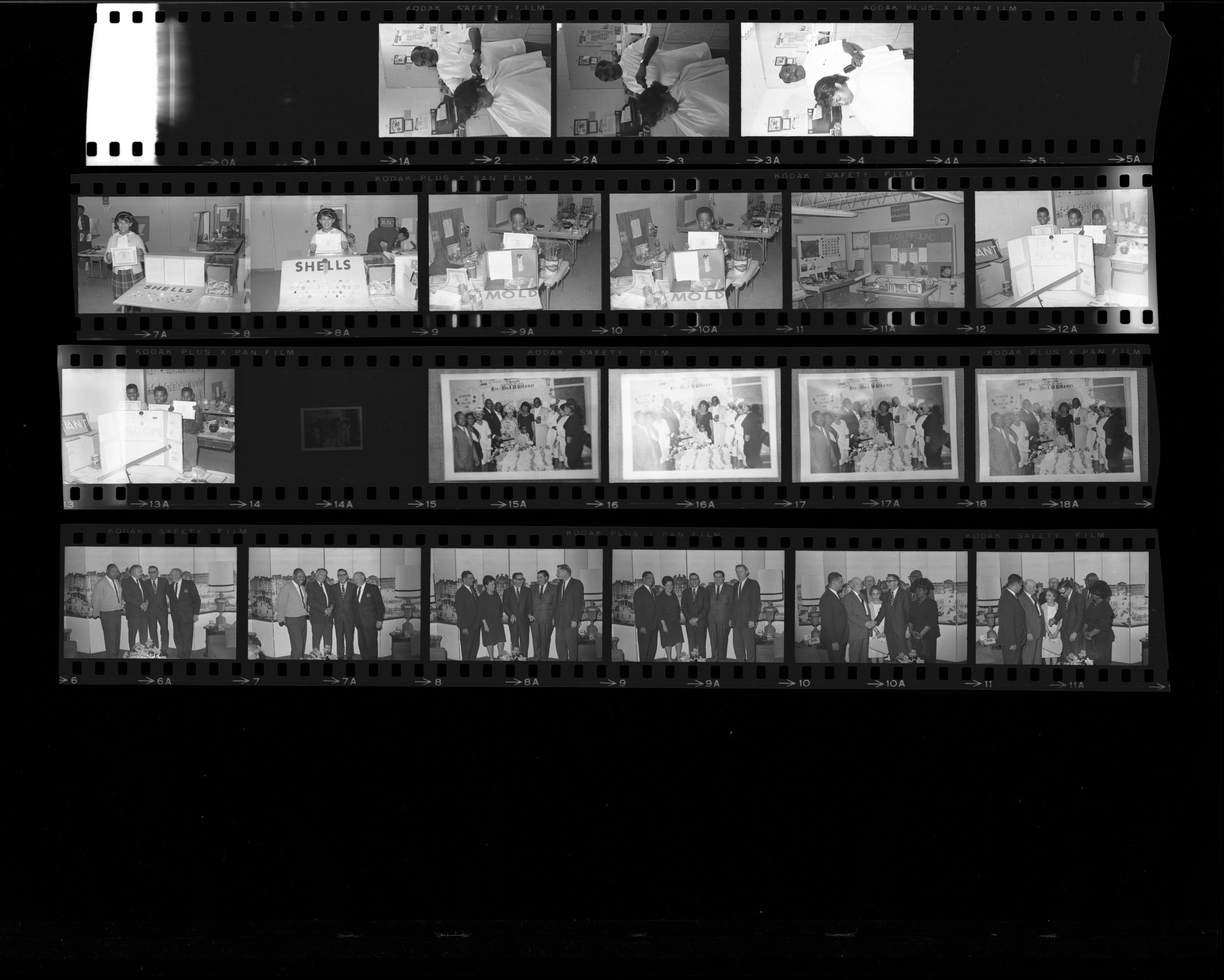 Set of negatives by Clinton Wright including Mack's Barber shop, copy of Wilson's anniversary, Medicare group at Riviera, Jefferson Day Care Birthday Party, science fair at Matt Kelly, rose at parking lot, New Jerusalem Baptist Church, and Sojona, 1966, page 1