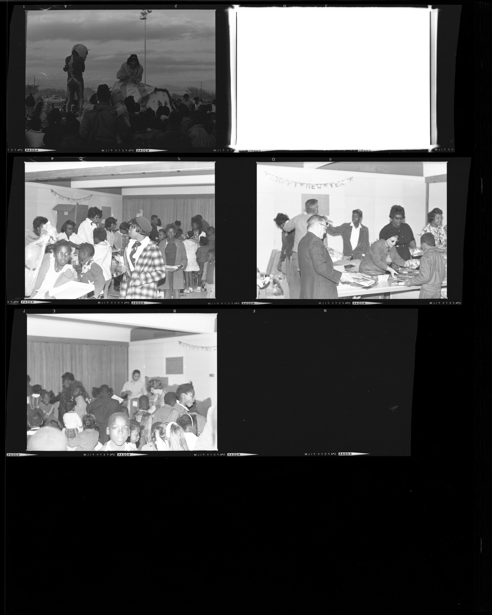 Set of negatives by Clinton Wright including treelighters, Kit Carson's Christmas Program, Reverend Donald Clark, and events at Matt Kelly and Madison, 1966, page 6