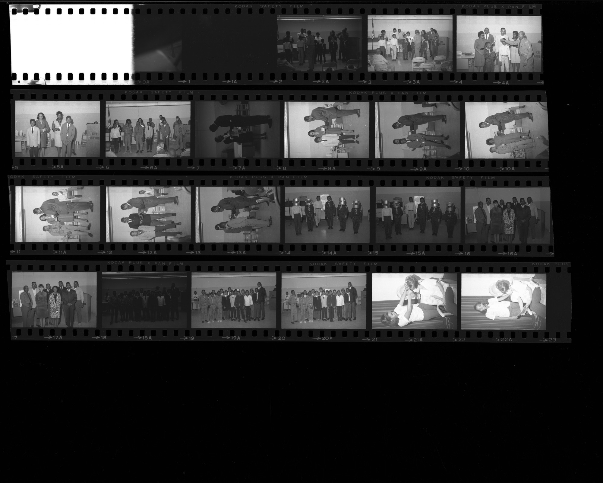Set of negatives by Clinton Wright including the Coterie Club, Christmas dinner at the Marvel Manor, groundbreaking at Zion, sorority at Lucile's, the Boy Scout program at Kit Carson, and Carolyn at a shop, 1966, page 1