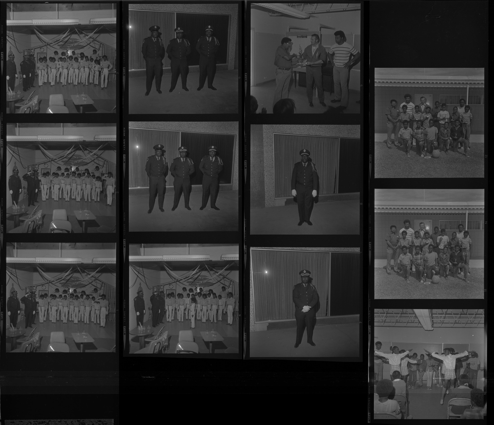 Set of negatives by Clinton Wright including Eleanor Hobert's children, Mrs. McGlothin club, Lucile Gee's child, Matt Kelley basketball team with Lee White, and Elks Drill Team, 1971, page 2