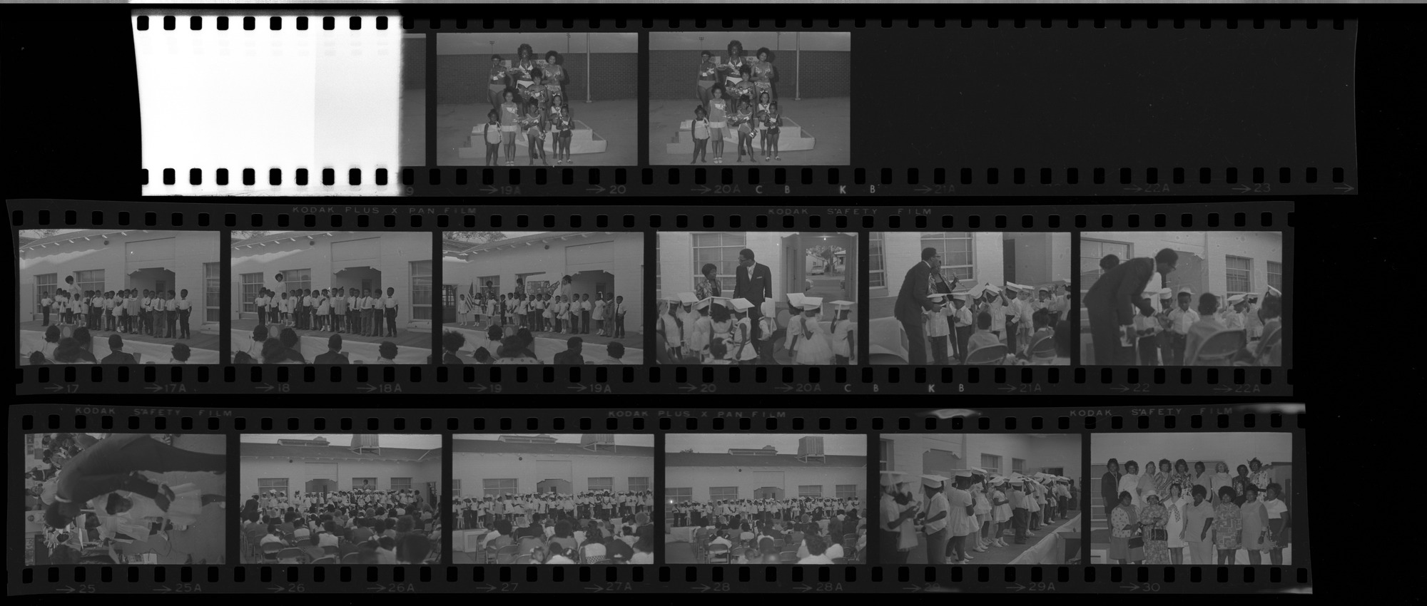 Set of negatives by Clinton Wright including Operation Independence Day Care graduation, Eloise Barnett's wedding, C.E.P. receptionist, and beauty contest at Doolittle, 1971, page 1