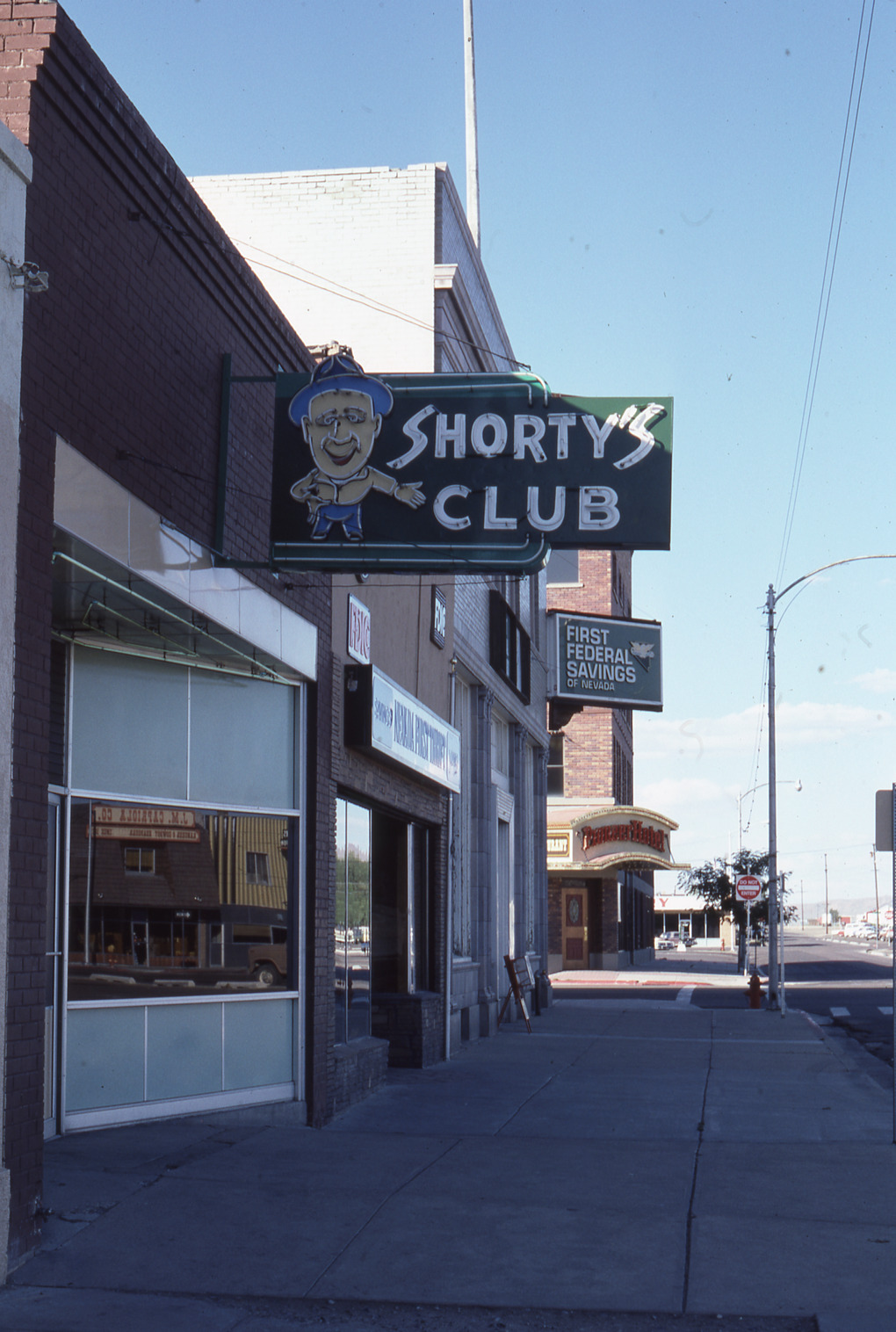 Shorty's Club flag mount wall sign, Elko, Nevada: photographic print