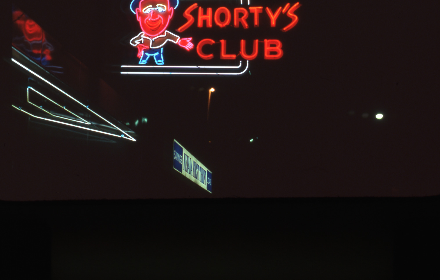 Shorty's Club flag mount wall sign, Elko, Nevada: photographic print