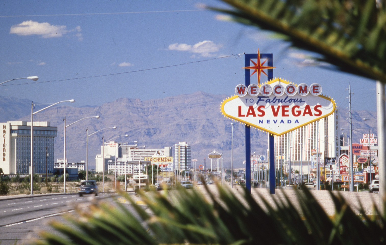 Welcome to Las Vegas flag mounted pylon sign, Las Vegas, Nevada: photographic print