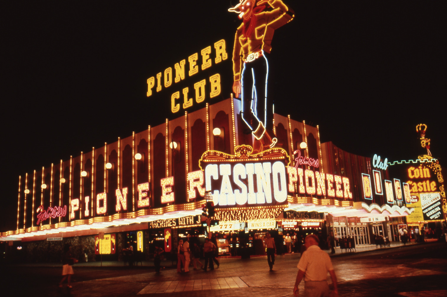 Pioneer Club featuring Vegas Vic flag mounted, lettering, and wall signs, Las Vegas, Nevada: photographic print