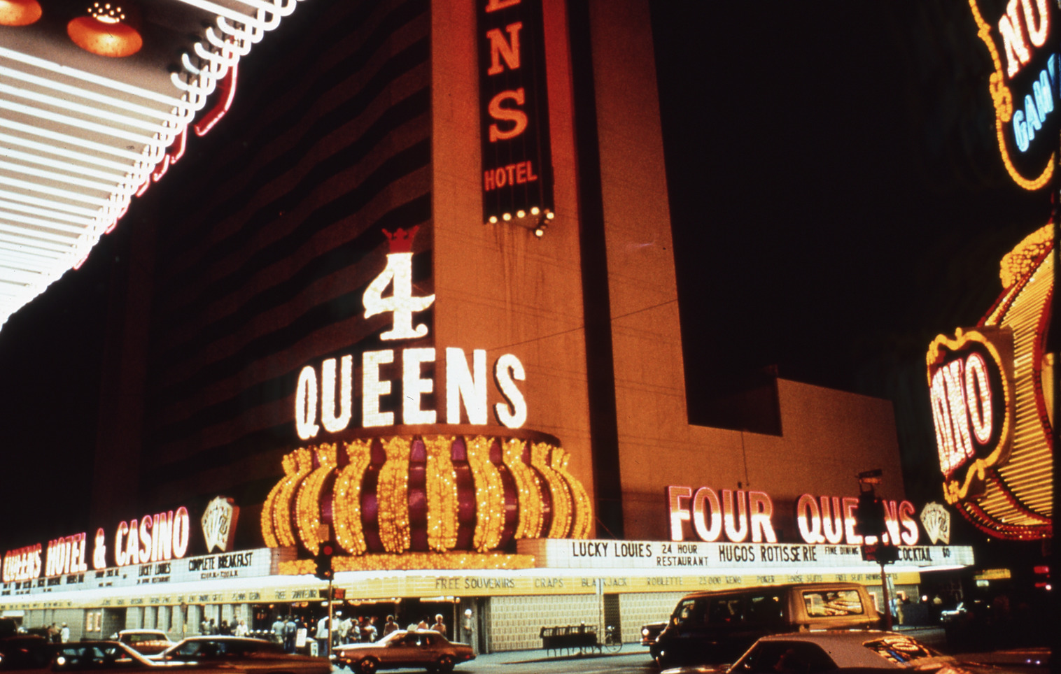 Four Queens flag mounted wall sign, lettering, and roof mounted signs, Las Vegas, Nevada: photographic print