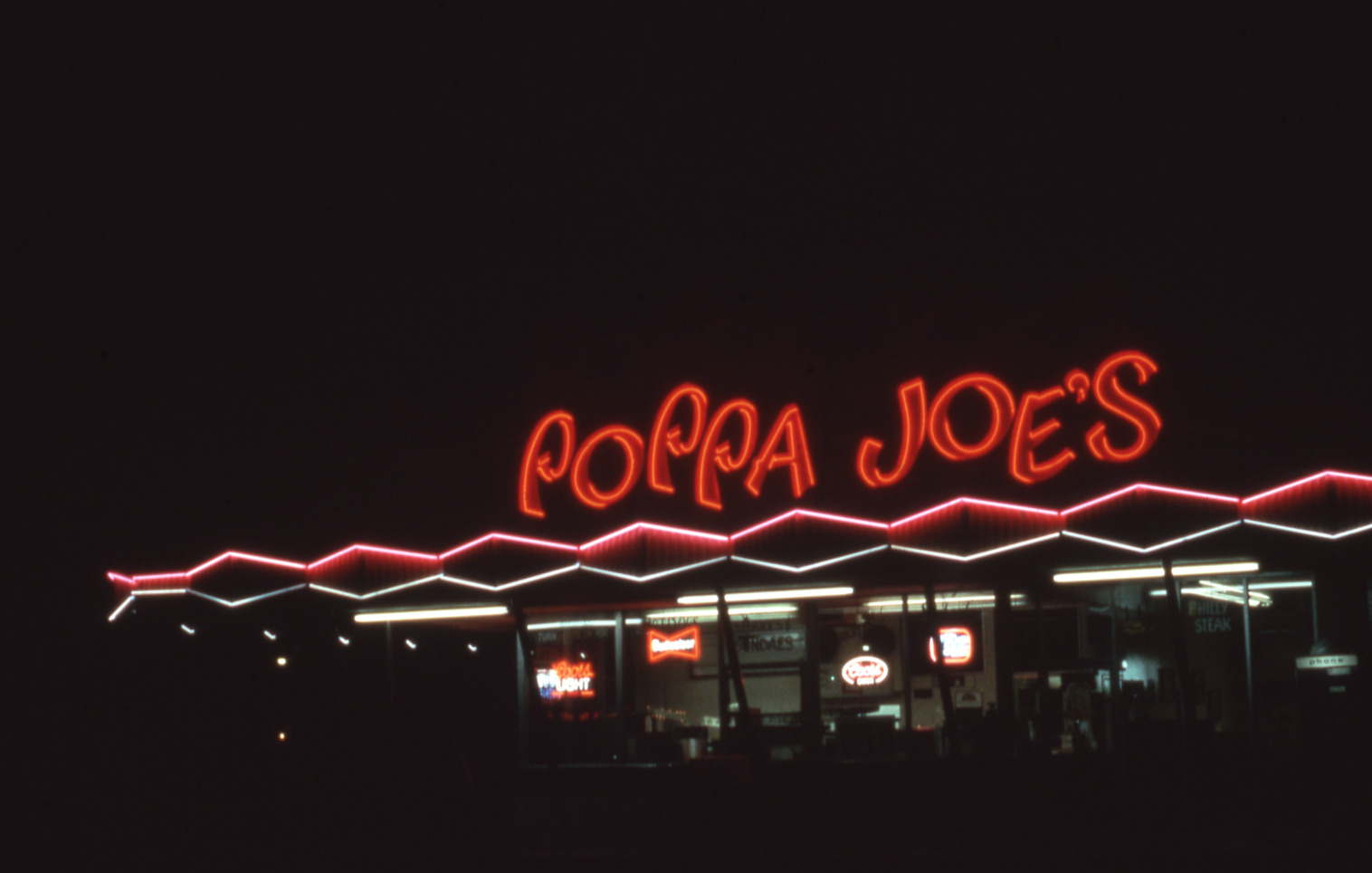 Poppa Joe's restaurant roof mounted and wall signs, Las Vegas, Nevada: photographic print