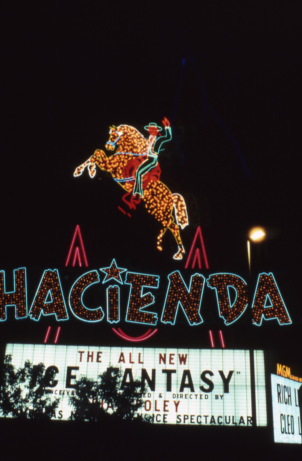 Hacienda Hotel lettering, marquee, and man riding horse signs, Las Vegas, Nevada: photographic print