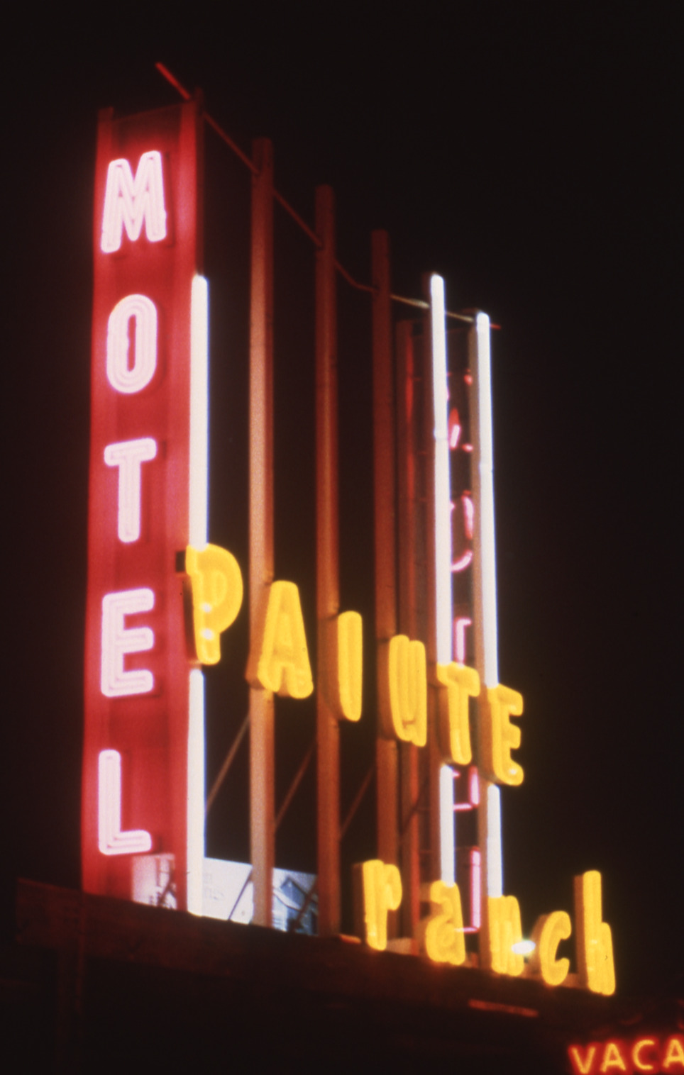 Paiute Ranch Motel roof and wall mounted signs, Reno, Nevada: photographic print