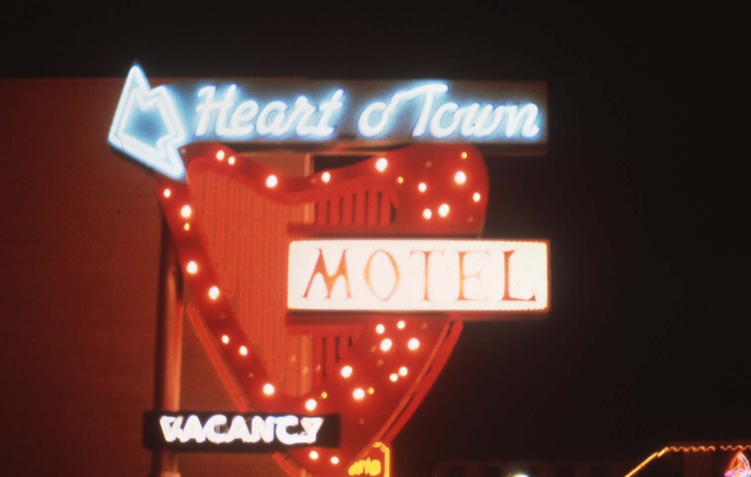 Heart o'Town Motel flag mounted pylon sign, Reno, Nevada: photographic print