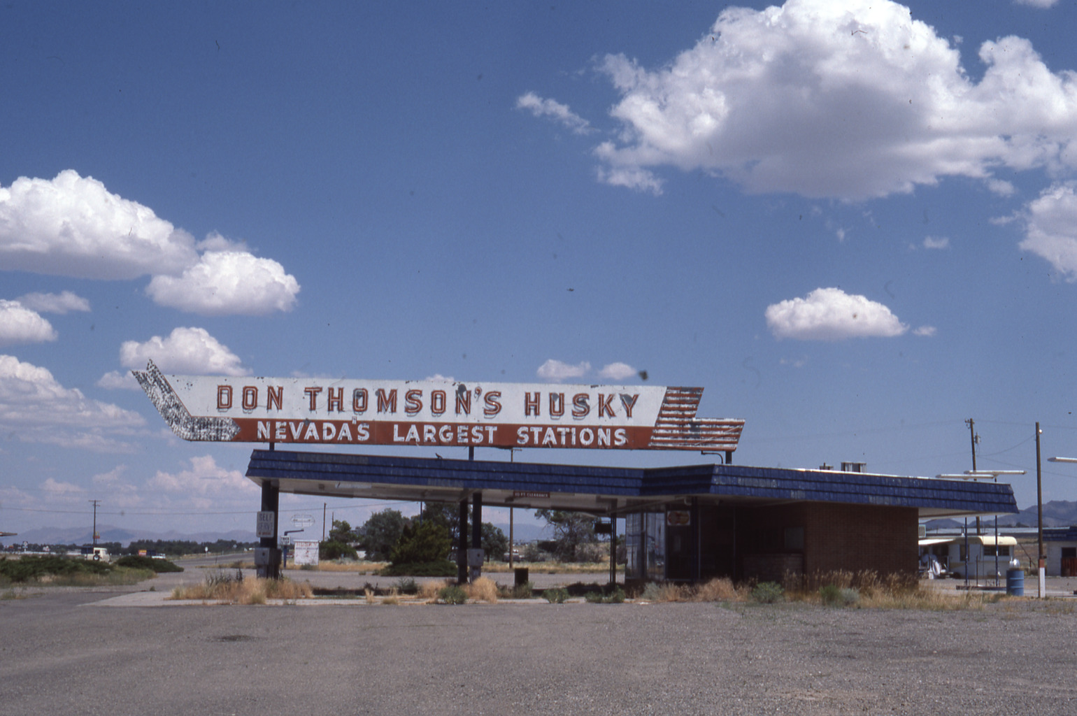 Husky Gas Station roof mounted sign, Winnemucca, Nevada: photographic print
