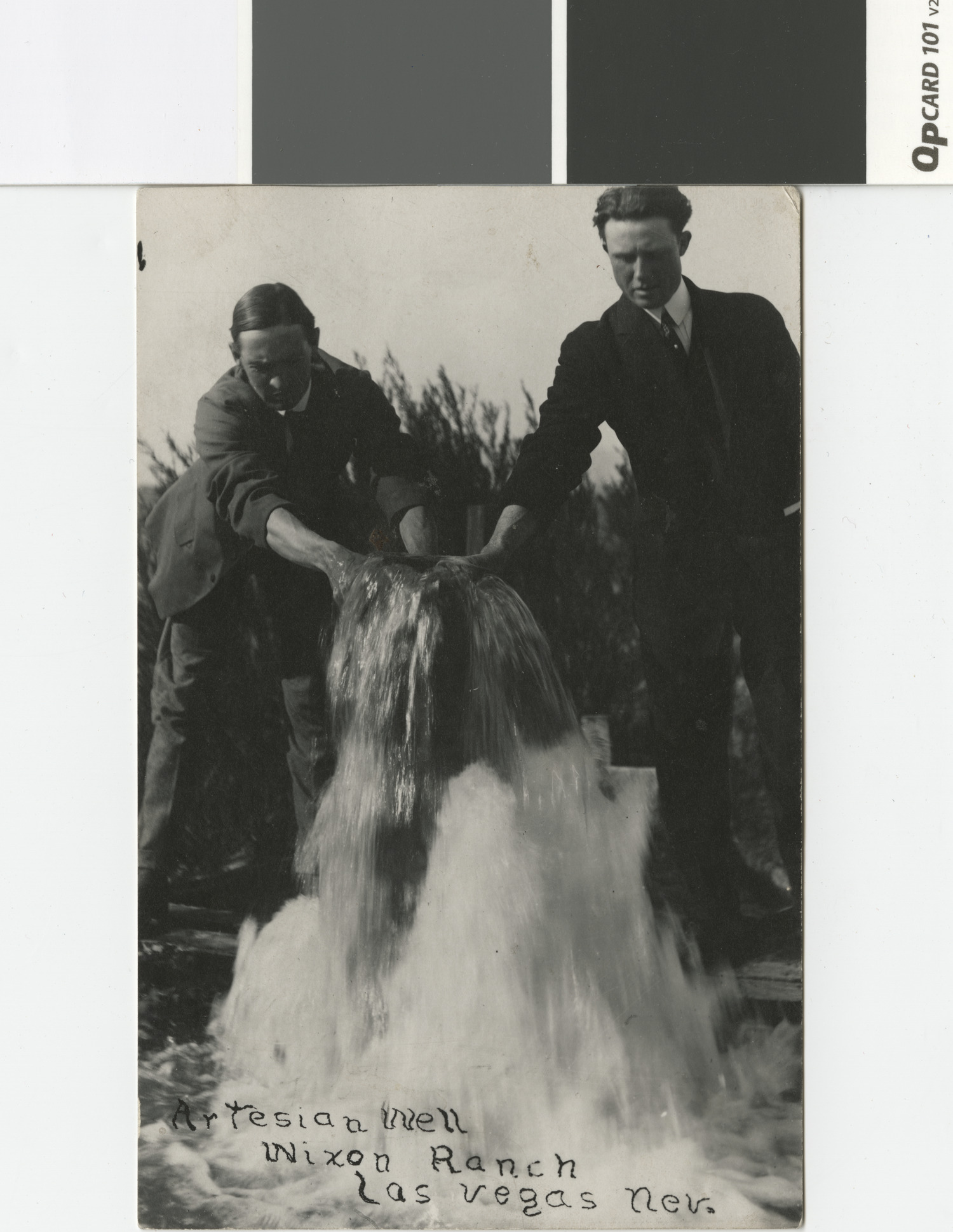Photograph of two men at an artesian well, Wixon Ranch, Las Vegas, Nevada, circa 1920s