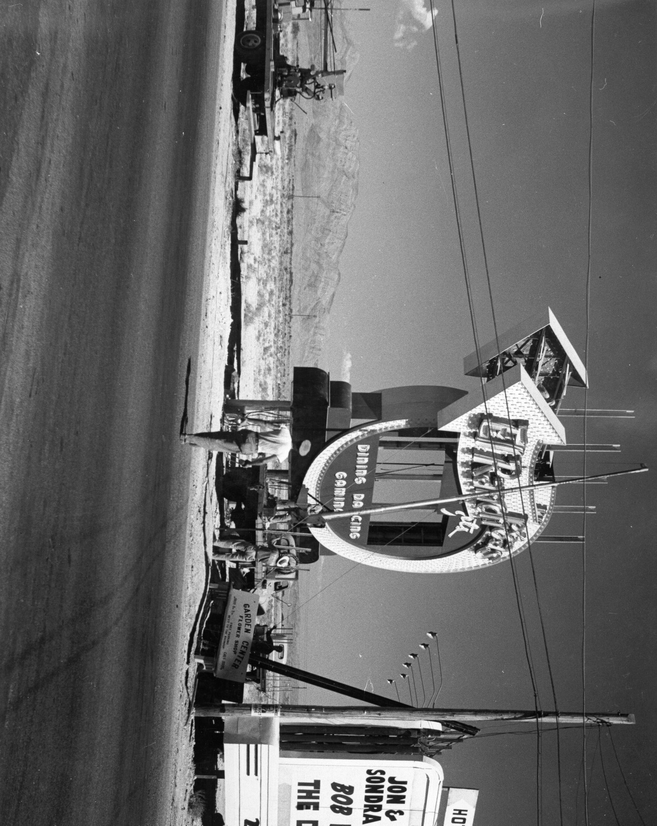 Photograph of the installation of a neon sign for El Rancho Vegas (Las Vegas), 1941