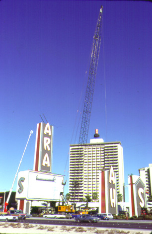 Photograph of construction of the neon sign in front of the Sahara Hotel and Casino (Las Vegas), 1980