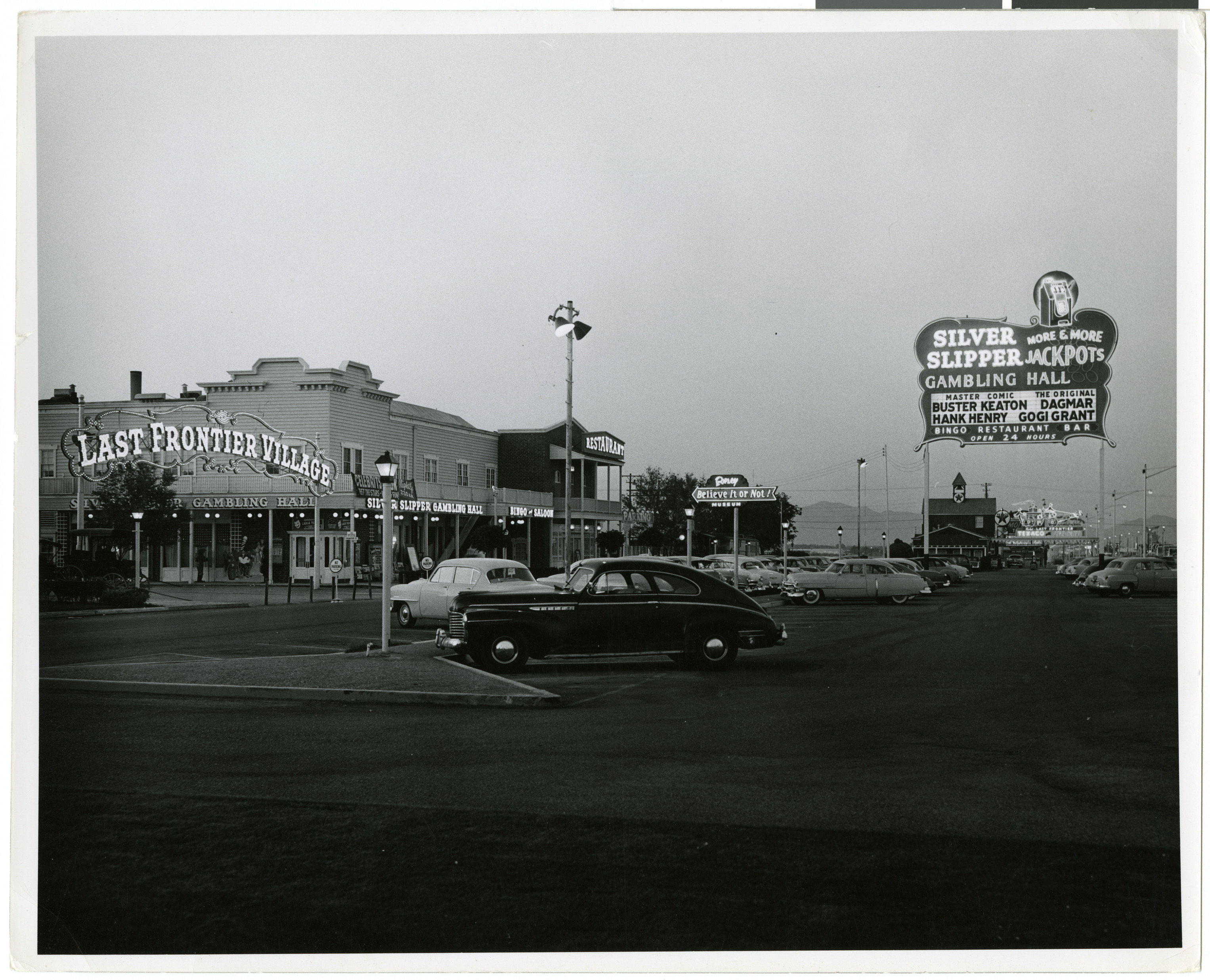 Photograph of the entrance to the Last Frontier Village at twilight (Las Vegas), circa early 1950s